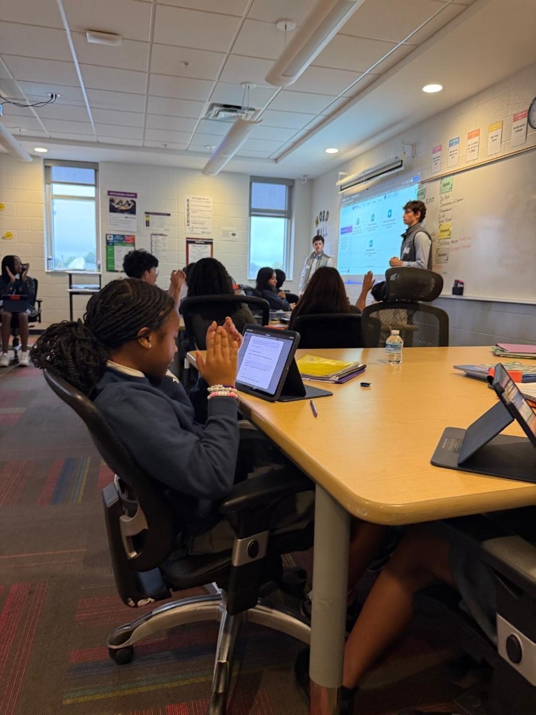 Students engaging with Finquest presentation